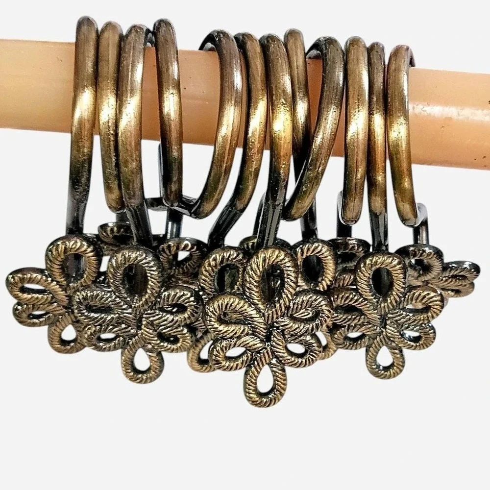 Set of 12 Gold Tone Metal Shower Curtain Hooks With An Antique Finish